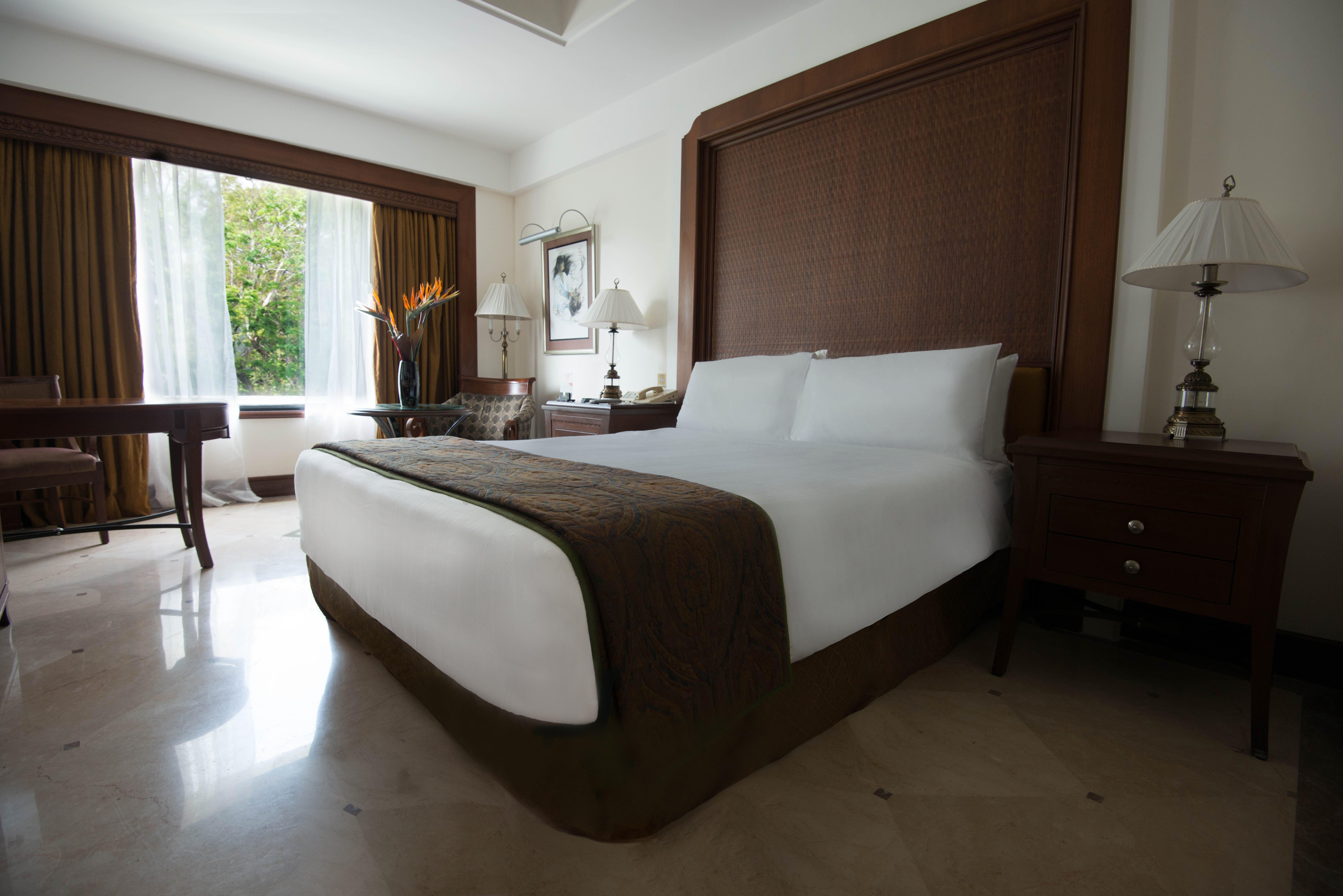 Crowne Plaza Chennai Adyar Park, An Ihg Hotel Esterno foto A bedroom at the Taj Bengal
